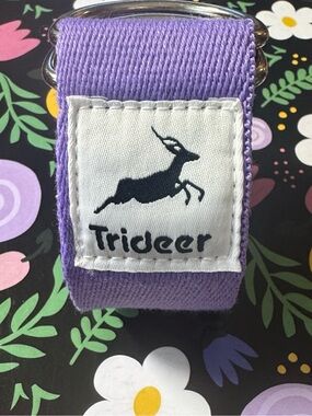 NWT & wrapping TRIDEER extra long purple leash. It measures 95” in total.